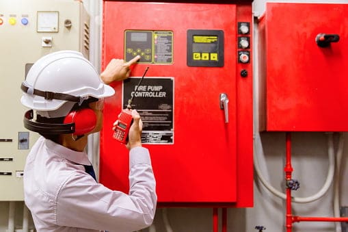 Engineer checking Industrial fire control system,Fire Alarm controller, Fire notifier, Anti fire.System ready In the event of a fire.