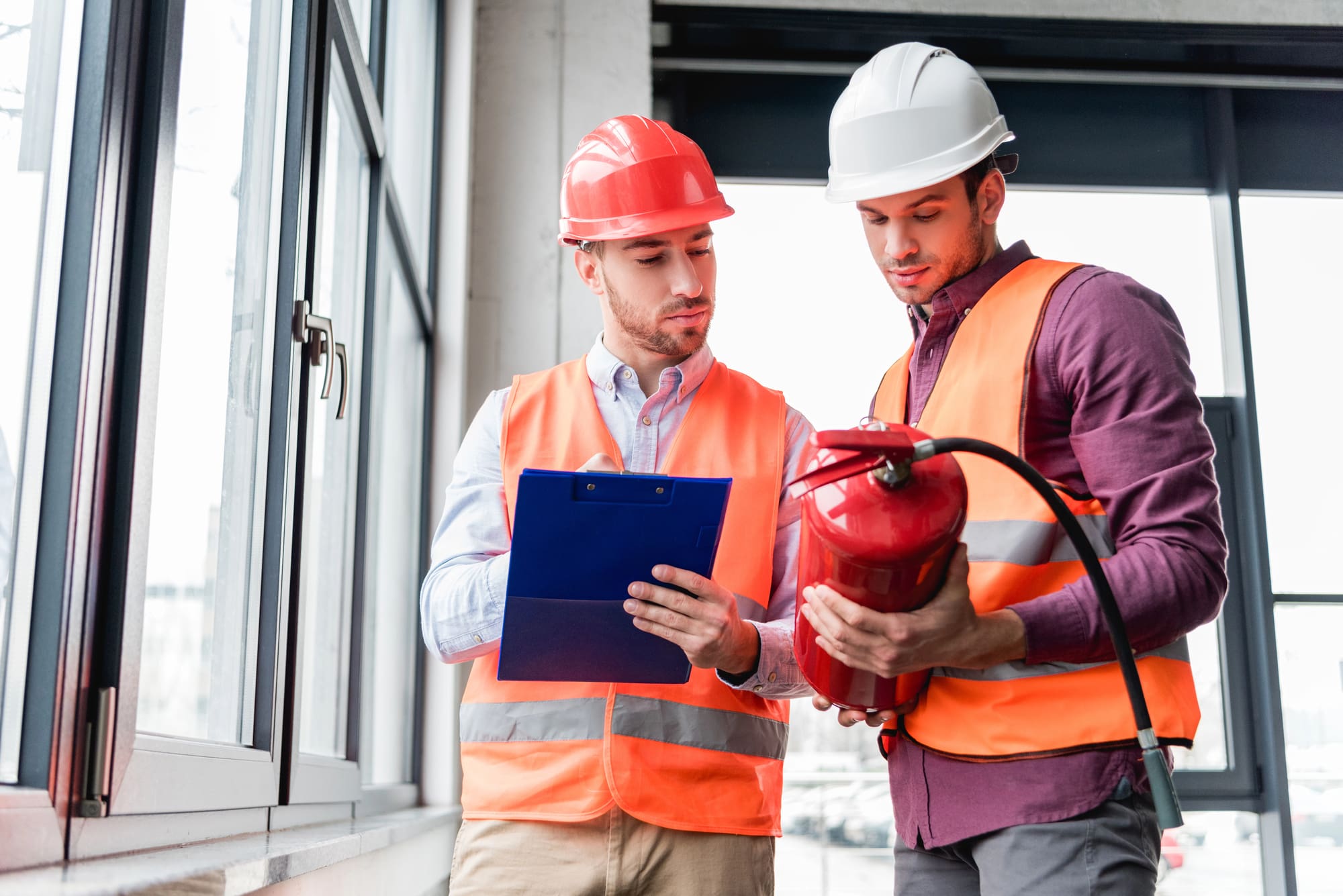 fire protection system provider Commercial fire protection system provider Rhodes Security Systems inspects extinguisher and safety equipment