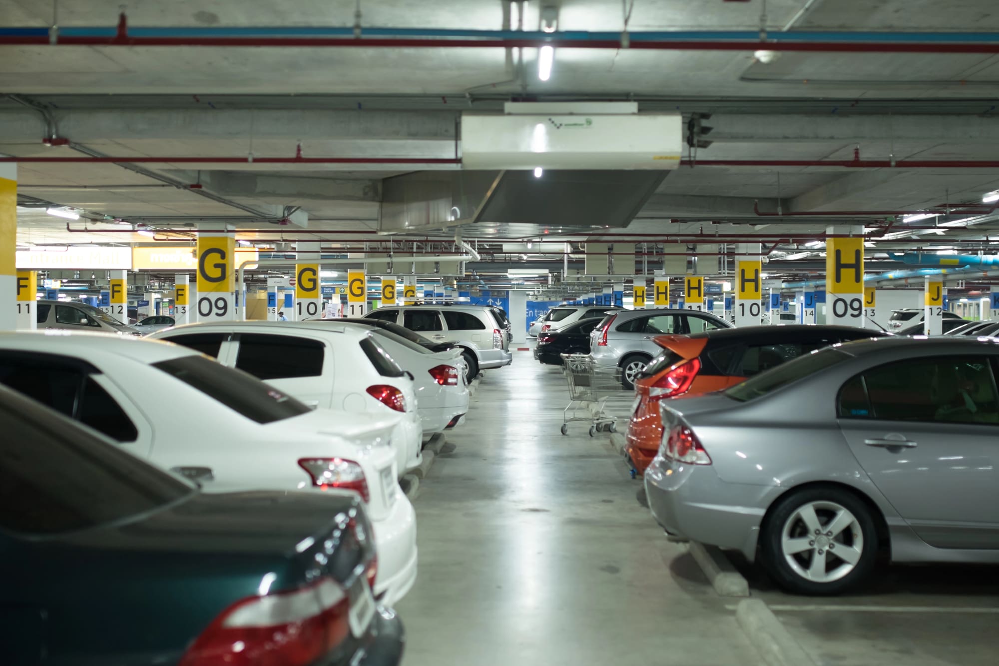 Commercial fire alarms needed in underground parking garage with parked cars
