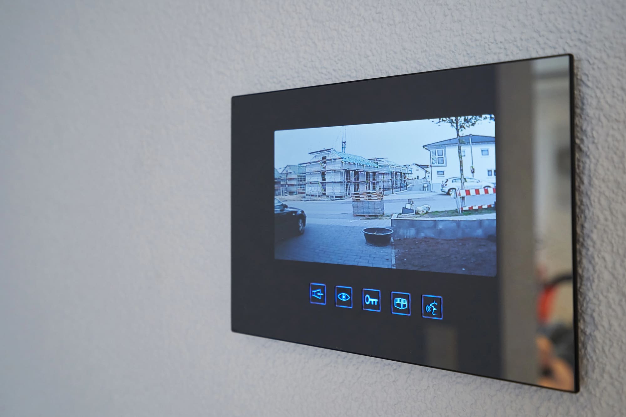 Video doorbell installation Cleveland includes indoor monitor displaying live security feed