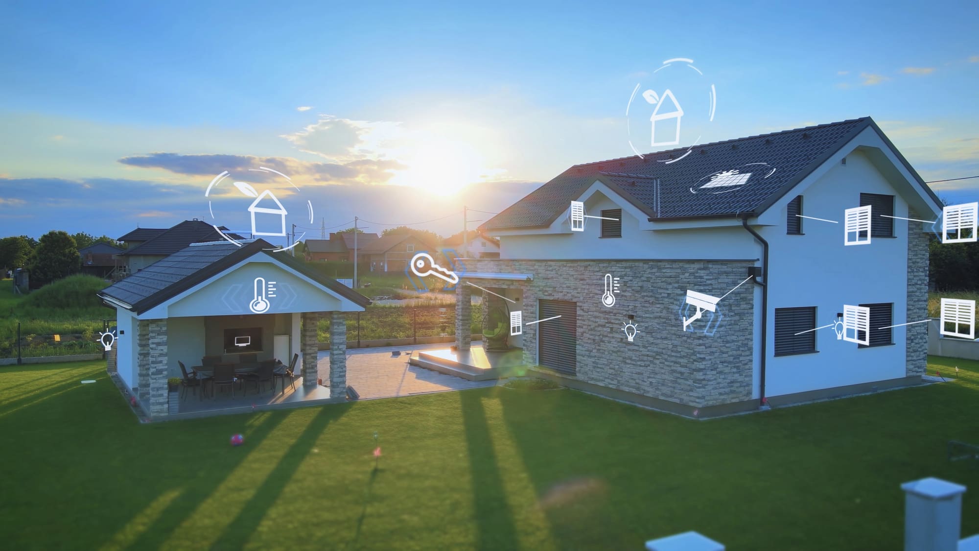 Home Automation System Installation icons overlaid on modern residential house at sunset