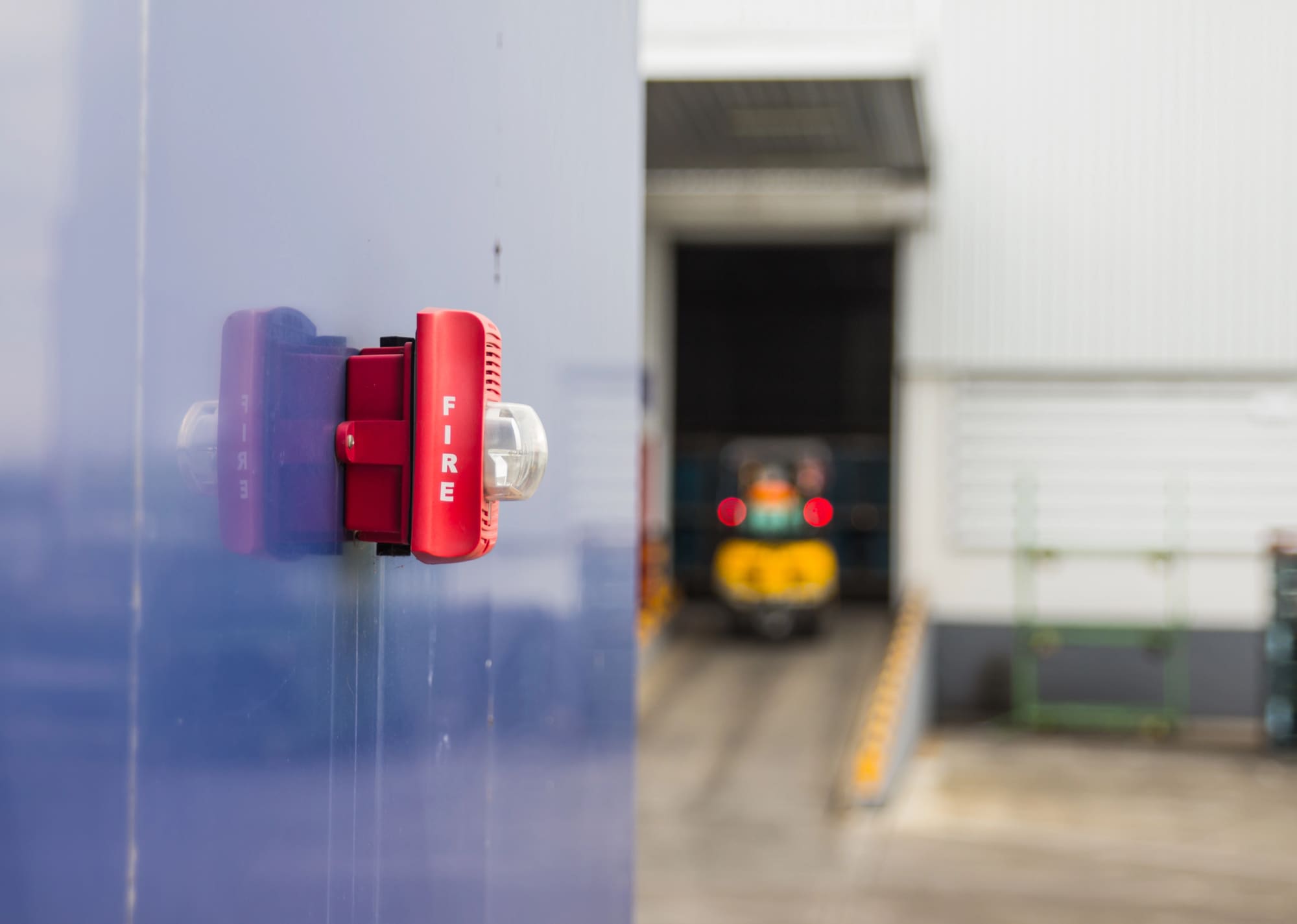 Fire code compliance services Cleveland alarm system installed at commercial warehouse loading dock